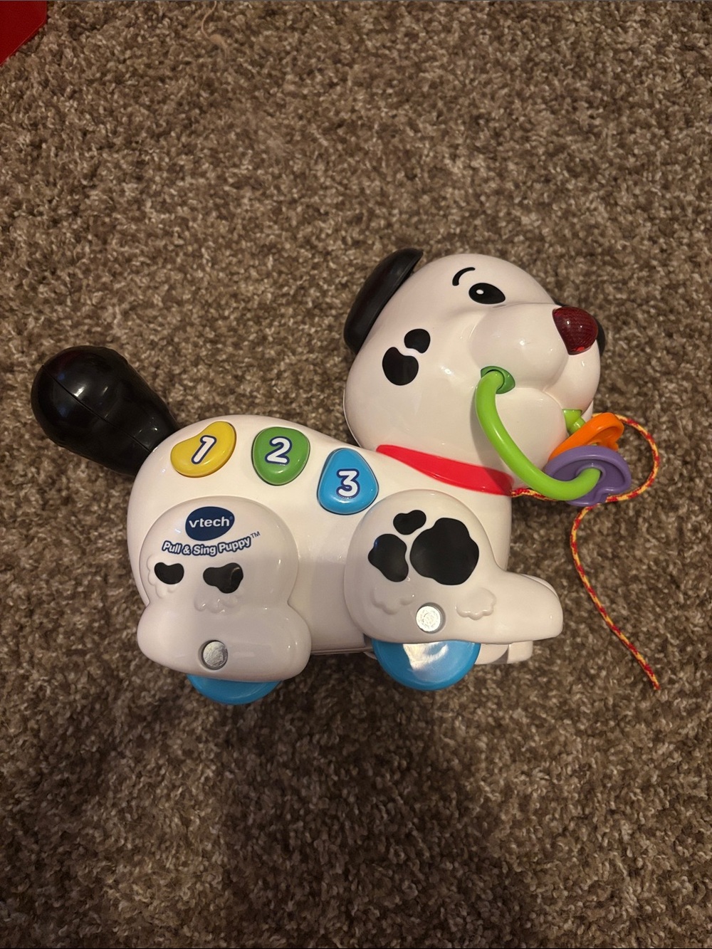 VTech Pull & Sing Puppy Toy - White with Black Spots